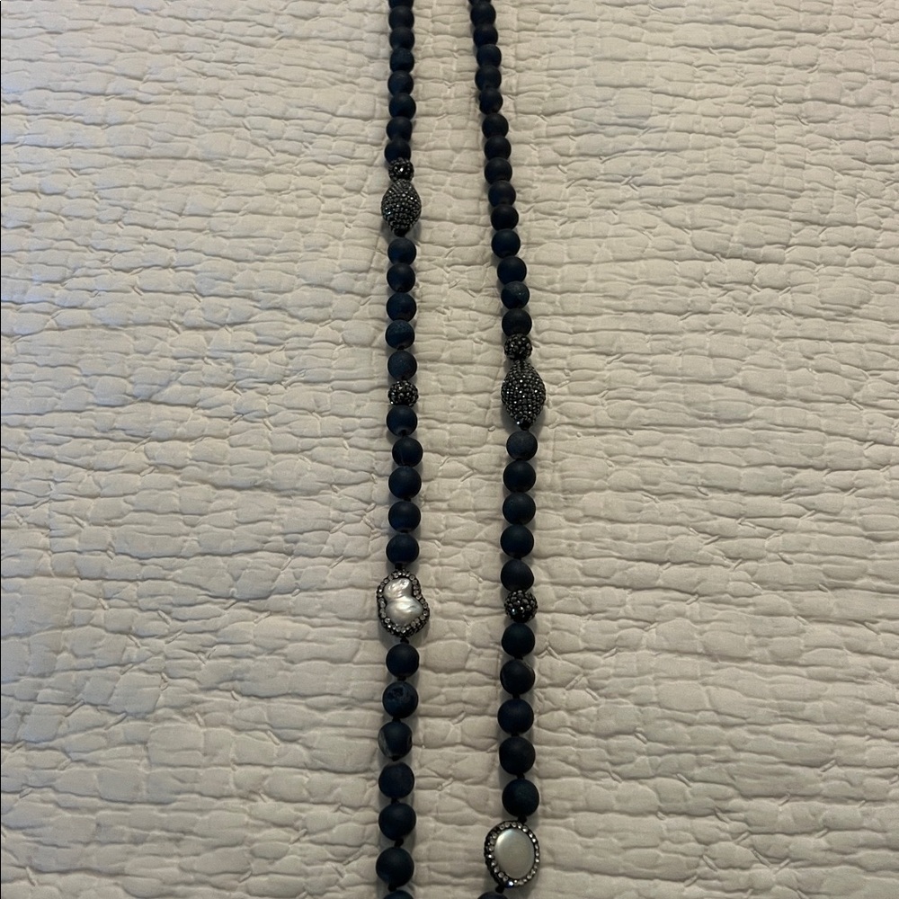 Elegant Lapis Blue Beaded Necklace with Silver Accents. 16 inches